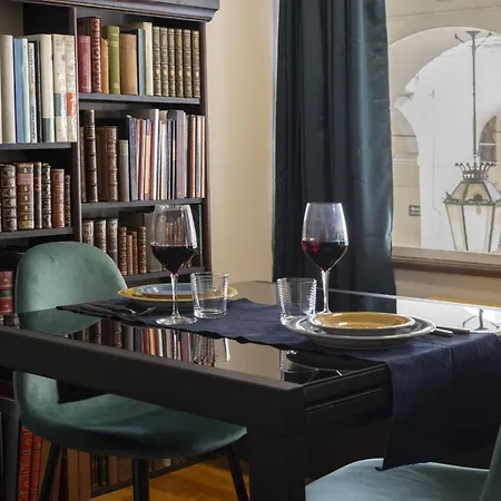 Apartment Bed & Books By Wonderful Italy